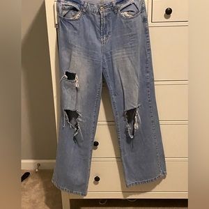 Ripped wide legged jeans